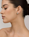 Female model wearing 14K Thick Circle Diamond Earrings 0.8ct