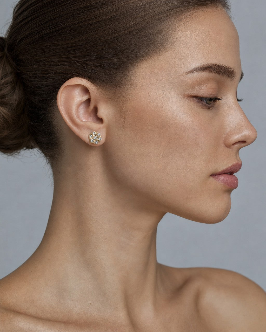 Female model wearing 14K Flower Diamond Earrings 1.2ct