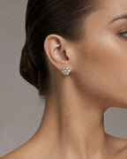 Female model wearing 14K Flower Diamond Earrings 1.4ct