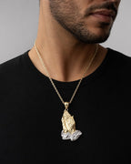 Male model wearing 14K Praying Hands Pendant 2.0"