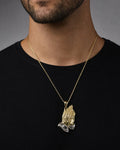 Male model wearing 14K Praying Hands Pendant 1.5"