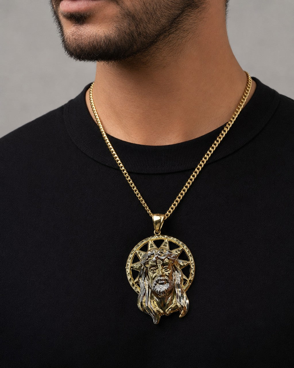 Male model wearing 14K Jesus Head With Halo Pendant 2.2"