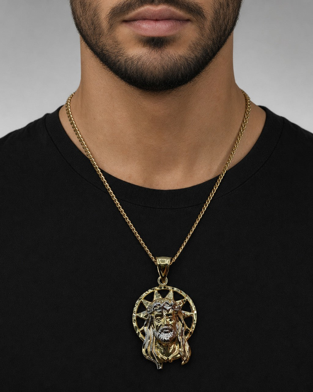 Male model wearing 14K Jesus Head With Halo Pendant 2.0"