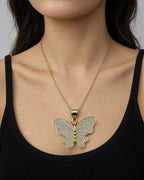 Female model wearing 14K Butterfly Pendant 1.4"