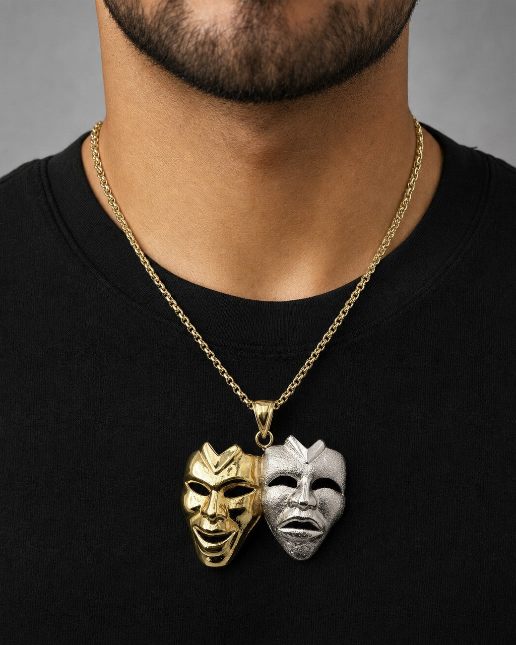 Male model wearing 10K Laugh Now Cry Later Pendant 1.7"