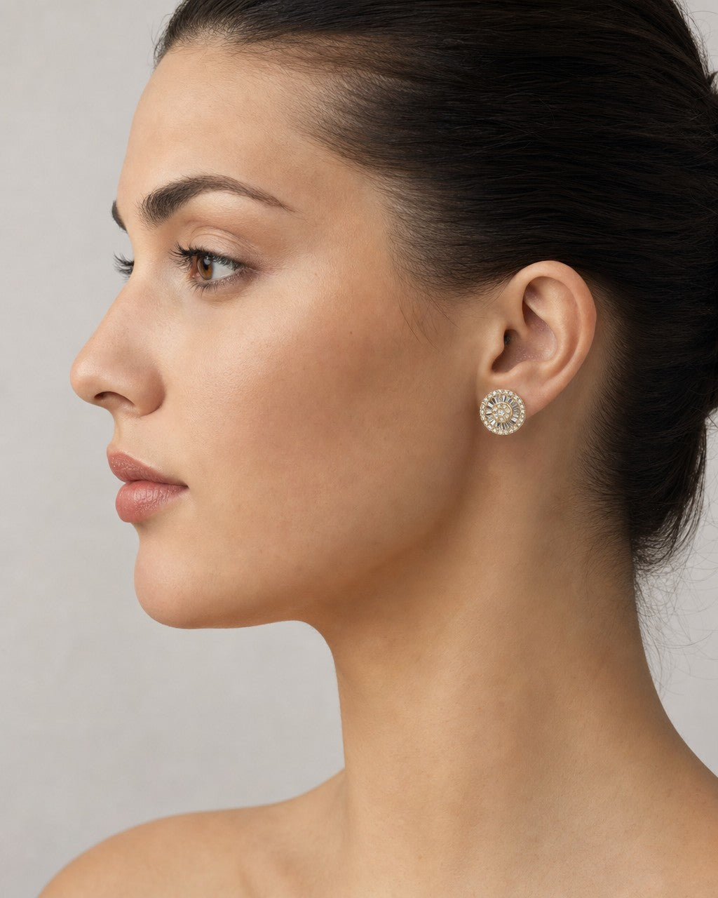 Female model wearing 14K Circle Gutter Diamond Baguette Earrings