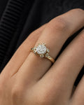 Female model wearing 14K Flower Diamond Engagement Ring