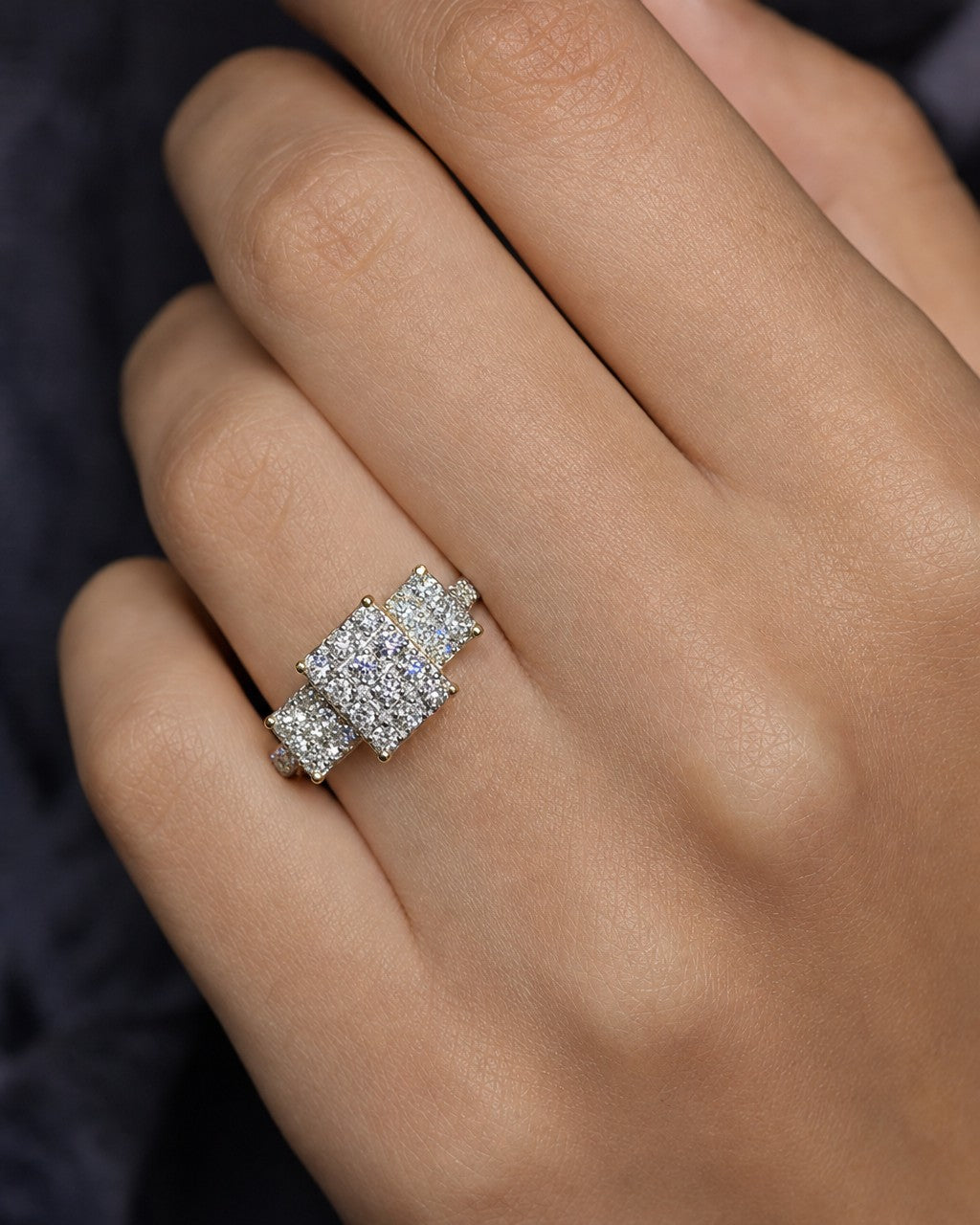 Female model wearing 14K Tri-stone Square Cluster Diamond Engagement Ring