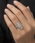 Female model wearing 14K Rounded Tri-stone Square Cluster Diamond Engagement Ring