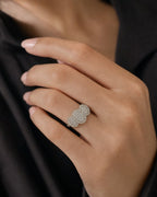 Female model wearing 14K Tri-stone Oval Shape Diamond Engagement Ring