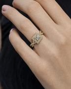 Female model wearing 14K Spiral Square Large Center Stone Diamond Engagement Ring