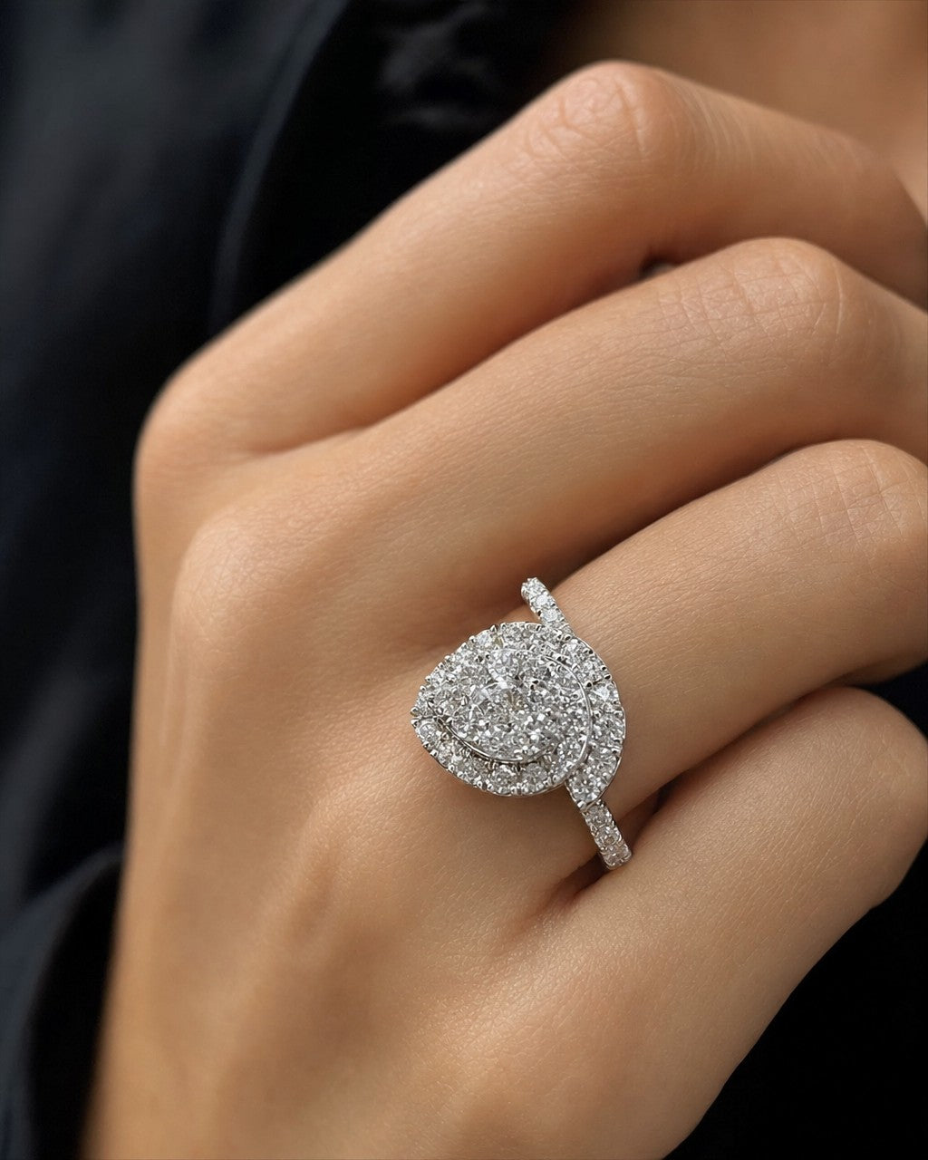 Female model wearing 14K Pear Shape Diamond Engagement Ring