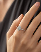 Female model wearing 14K Pear Shape Large Center Stone Diamond Engagement Ring