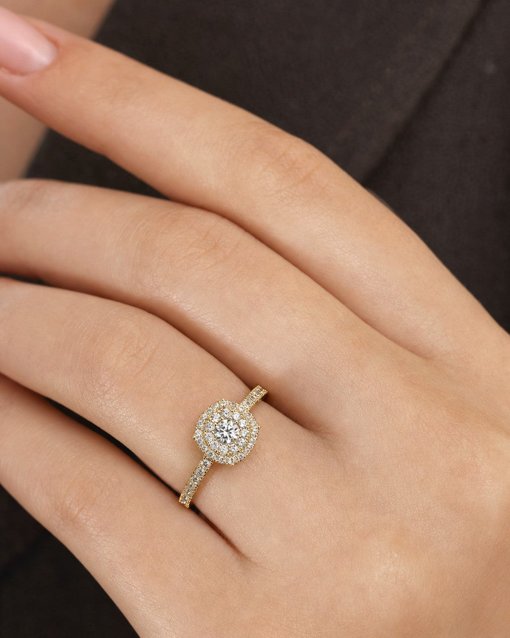 Female model wearing 14K Circle Diamond Engagement Ring
