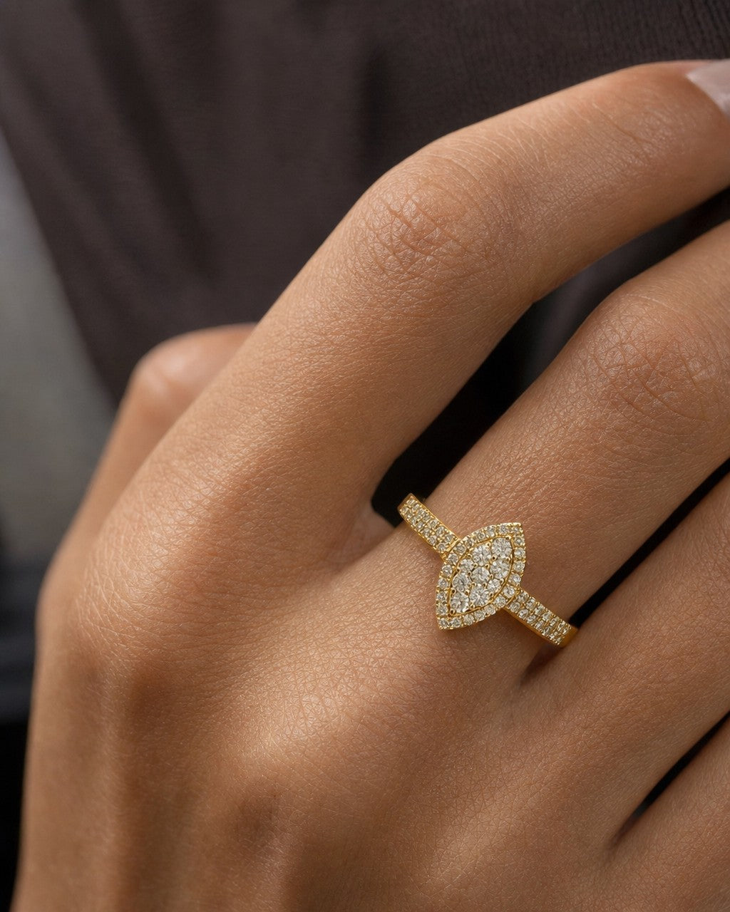 Female model wearing 14K Almond Diamond Engagement Ring