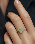 Female model wearing 14K Oval Diamond Engagement Ring