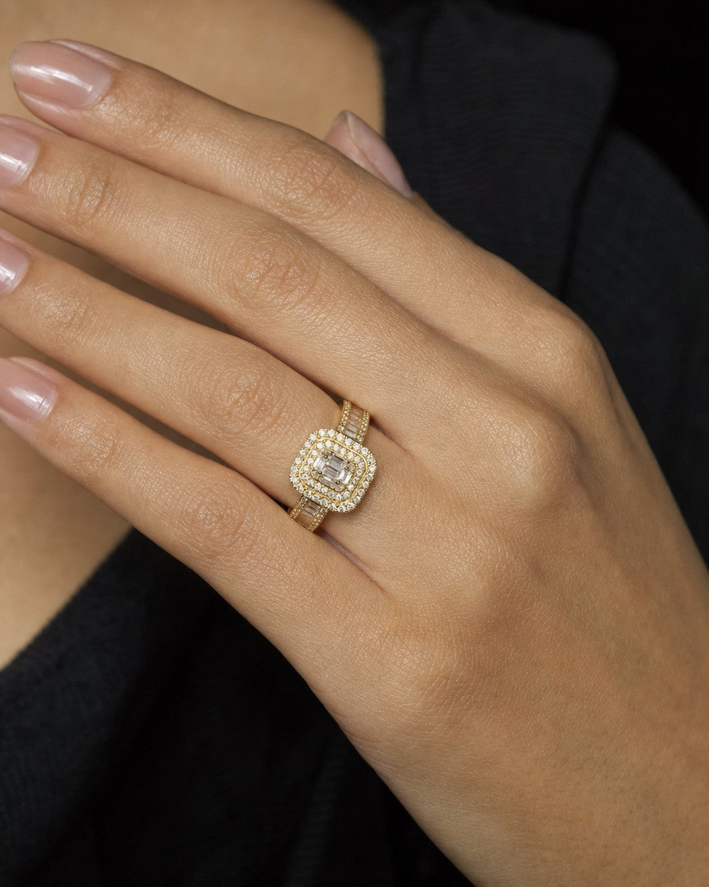 Female model wearing 14K Square Diamond with Baguette Center Engagement Ring