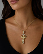 Female model wearing 14K Baby Jesus Pendant 1.5"