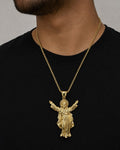Male model wearing 14K Jesus With Halo Pendant 2.2"