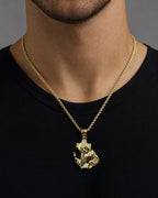 Male model wearing 14K Jesus Carrying Cross Pendant 1.25"