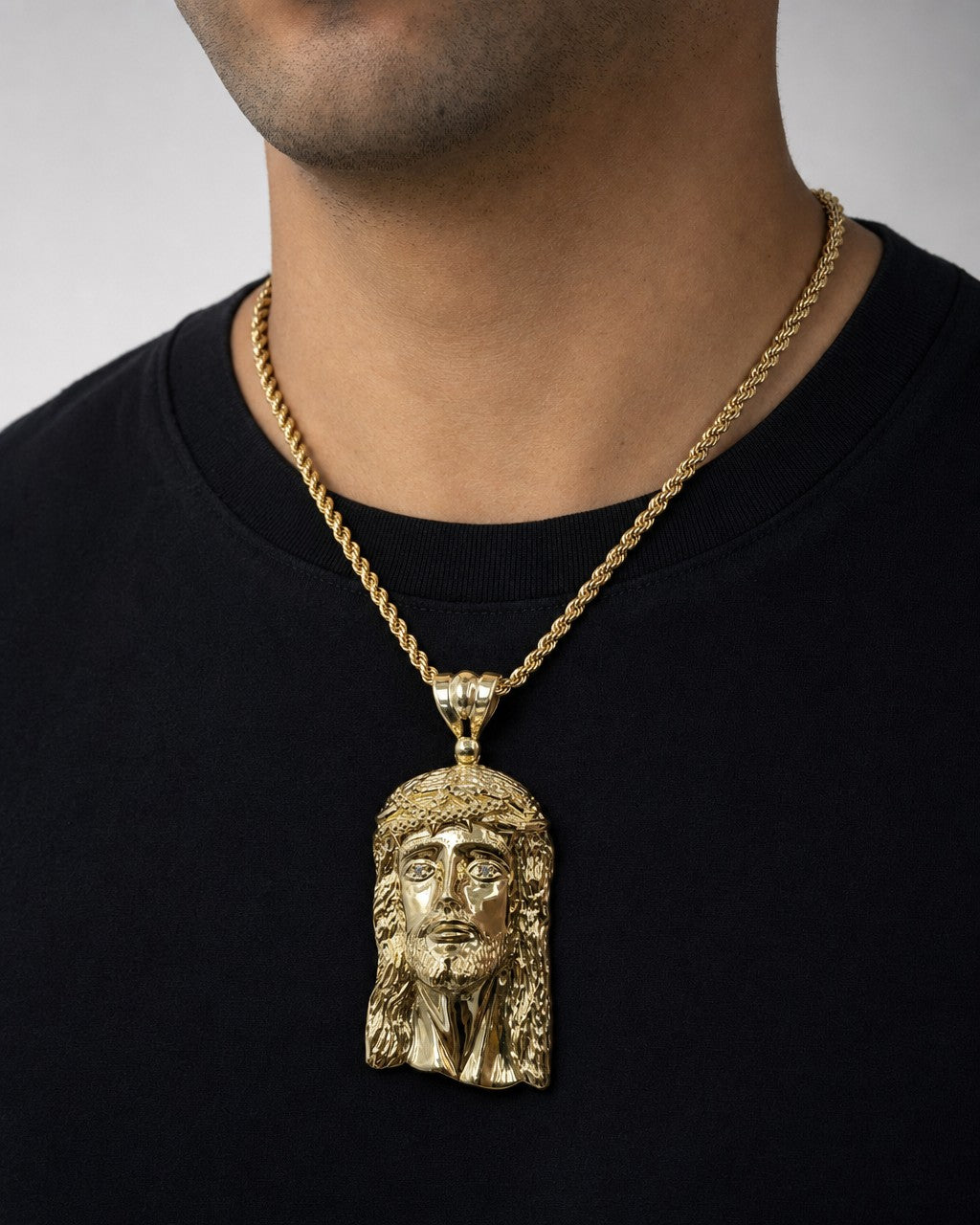 Male model wearing 14K Jesus Head Pendant 3.25"