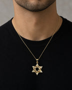 Male model wearing 14K Star of David Pendant
