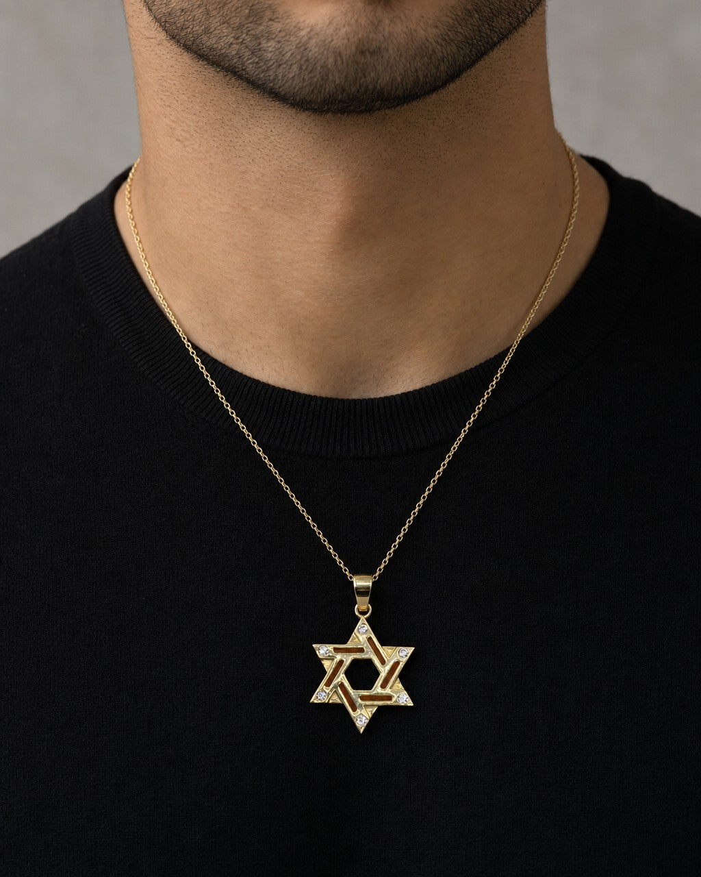 Male model wearing 14K Star of David Pendant