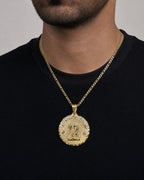 Male model wearing 14K Saint Caridad del Cobre Round Medallion Pendant 2.0"