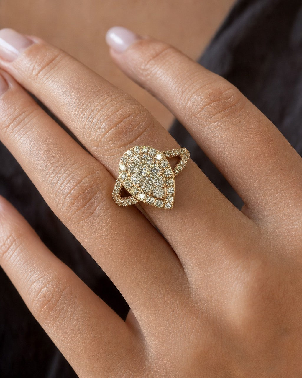 Female model wearing 14K Large Pear Shape Diamond Engagement Ring