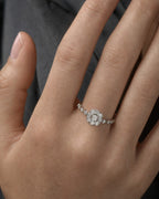 Female model wearing 14K Elegant Bloom Diamond Engagement Ring