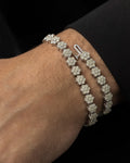 Male model wearing 14K 5.5MM Flower Diamond Bracelet 8.5"
