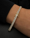 Male model wearing 14K 4.5MM Tennis Diamond Baguette Bracelet 8"
