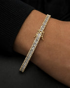 Male model wearing 14K 4.5MM Tennis Diamond Baguette Bracelet 8"