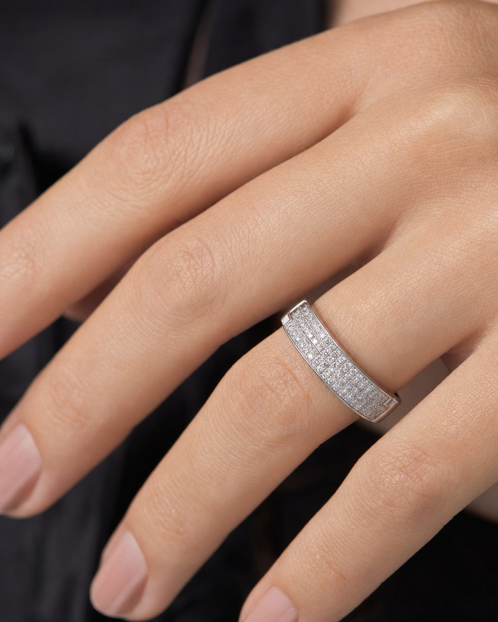 Female model wearing 10K Icy Diamond Wedding Band