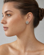 Female model wearing 14K Jumbo Regal Circle Diamond Baguette Earrings
