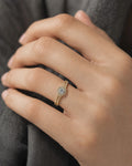 Female model wearing 14K Yellow Gold Circle Diamond Engagement Ring