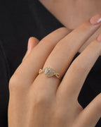 Female model wearing 14K Yellow Gold Infinity Band Diamond Engagement Ring