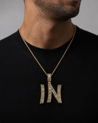 Male model wearing 14K Initial N Diamond Baguette Pendant