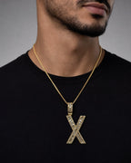 Male model wearing 14K Initial X Diamond Baguette Pendant