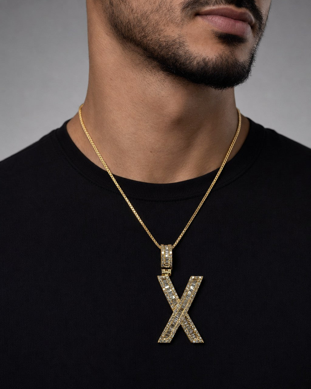 Male model wearing 14K Initial X Diamond Baguette Pendant