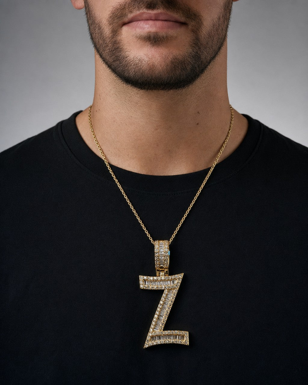 Male model wearing 14K Initial Z Diamond Baguette Pendant