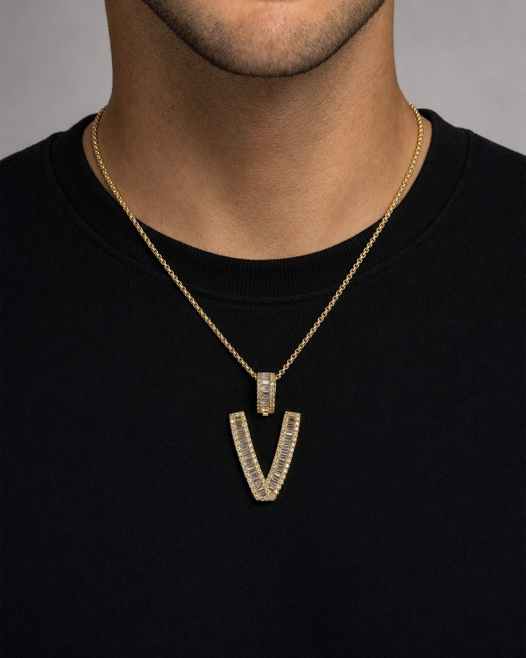 Male model wearing 14K Initial V Diamond Baguette Pendant