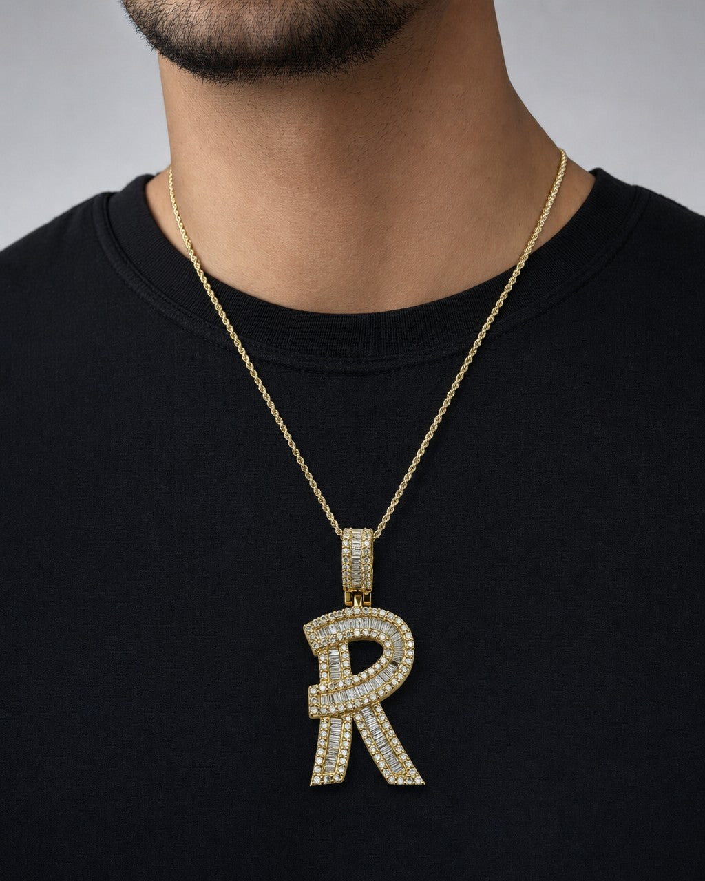 Male model wearing 14K Initial R Diamond Baguette Pendant