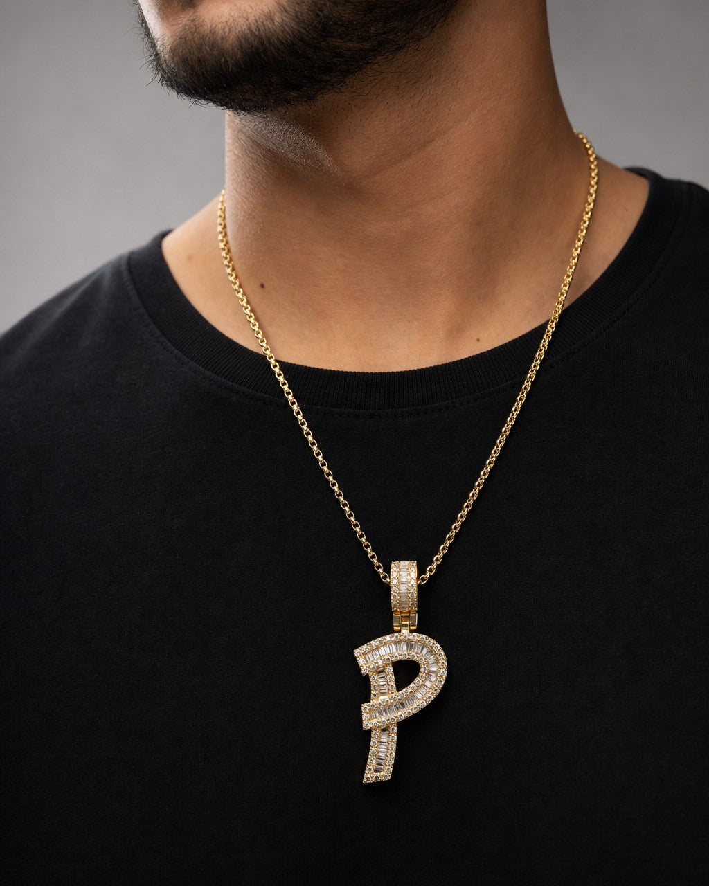 Male model wearing 14K Initial P Diamond Baguette Pendant