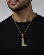 Male model wearing 14K Initial L Diamond Baguette Pendant