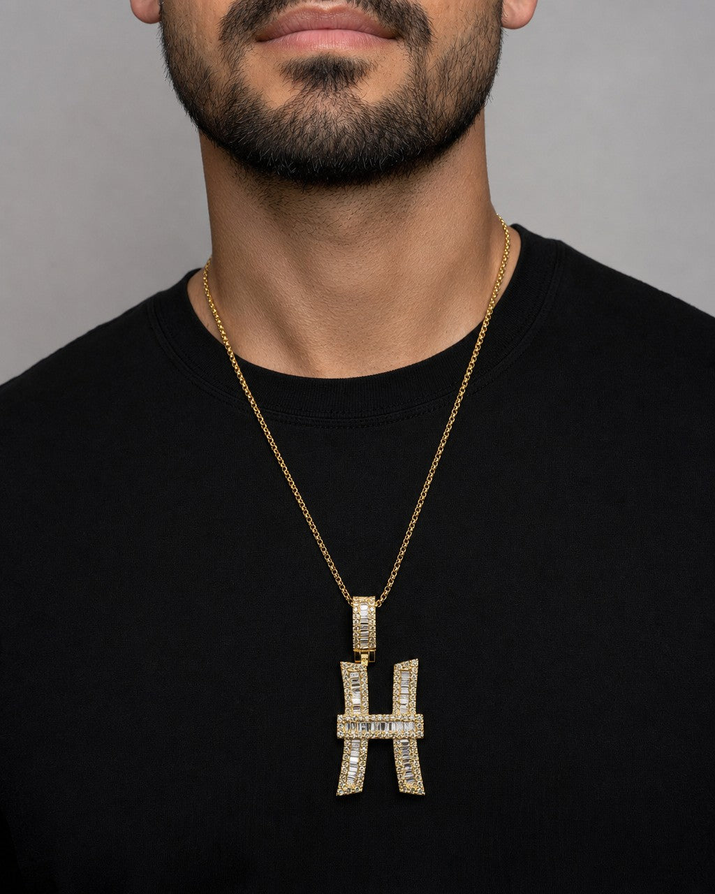 Male model wearing 14K Initial H Diamond Baguette Pendant