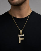 Male model wearing 14K Initial F Diamond Baguette Pendant