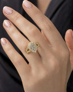 Female model wearing 14K Pear Shape Diamond Engagement Ring