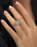 Female model wearing 14K Halo Circle with Large Center Stone Diamond Ring