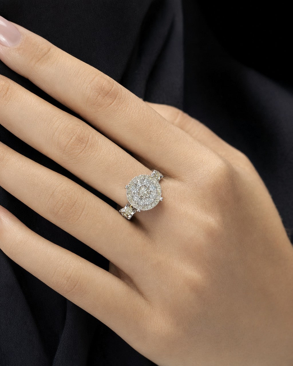 Female model wearing 14K Jumbo Circle Halo Diamond Engagement Ring